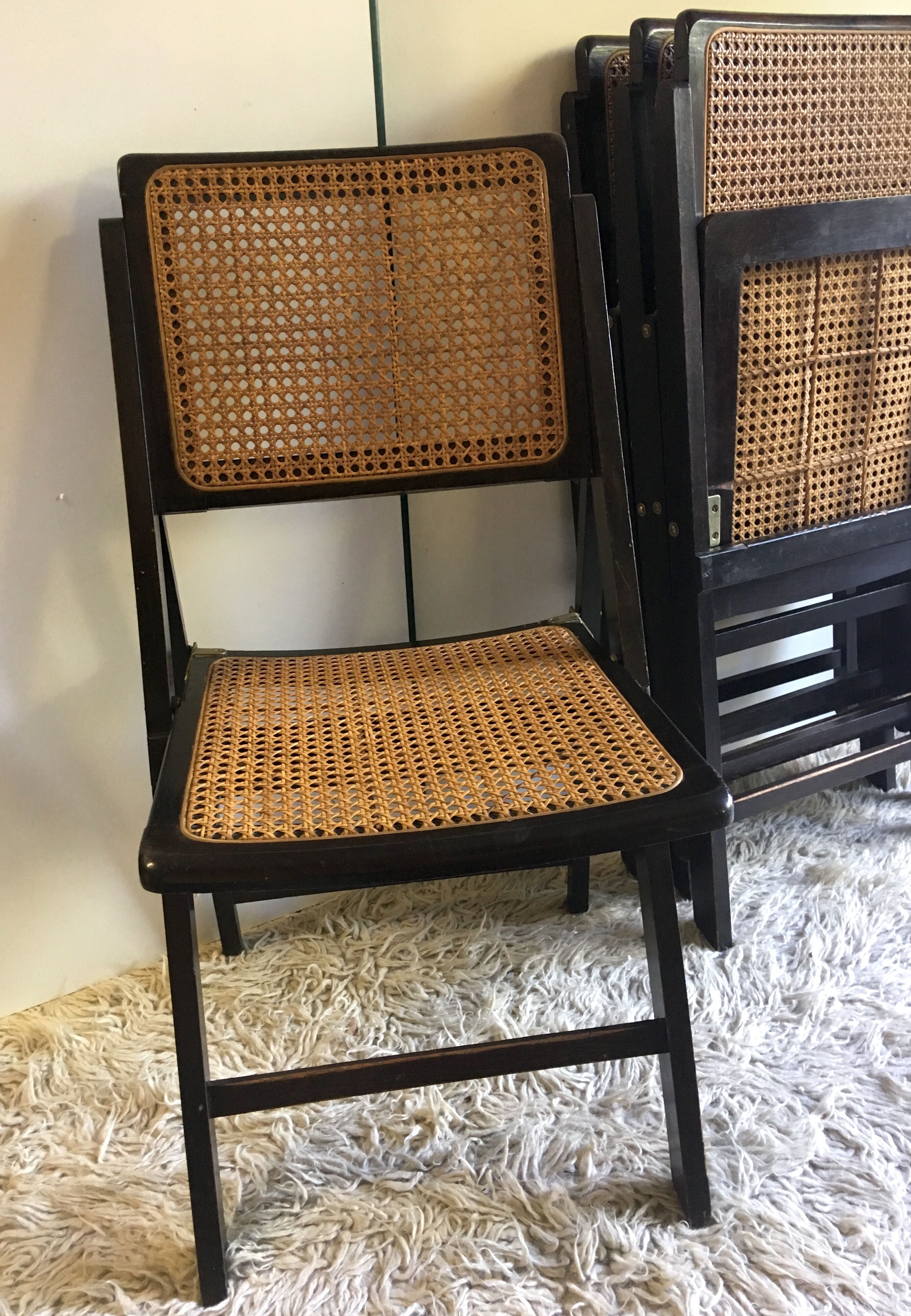 Four folding wooden and canning chairs - 70s