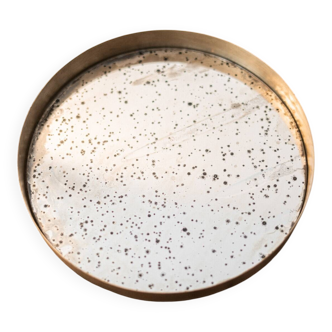 Patinated mirrored top and brass