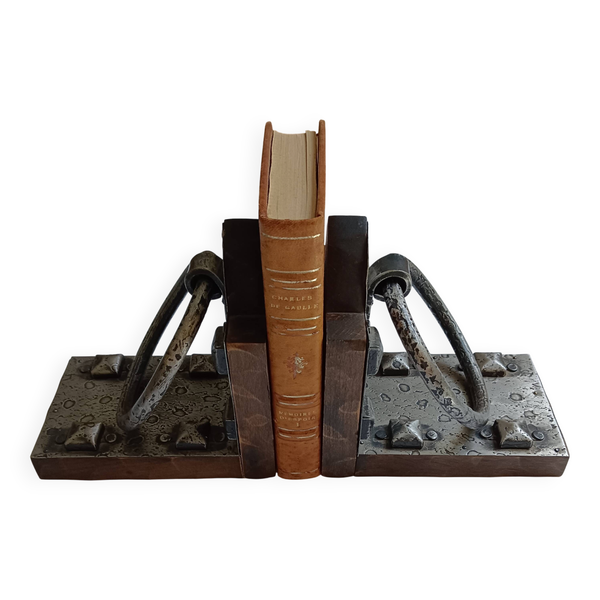 Medieval-style bookends, antique door handle.
