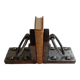 Medieval-style bookends, antique door handle.