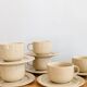 Ensemble de 11 tasses à café en grès moucheté