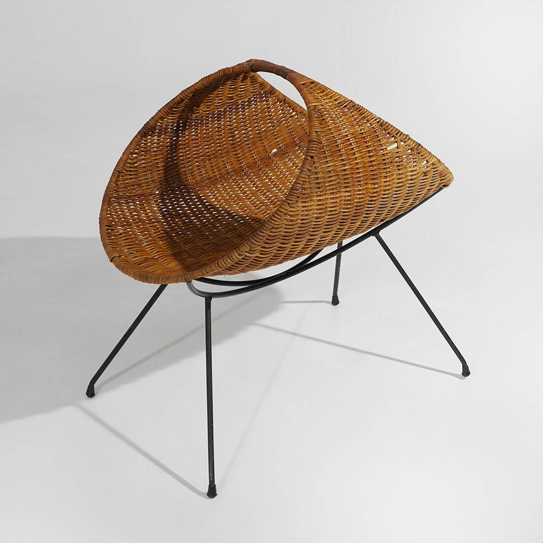 Rattan magazine rack with metal legs, 1950s