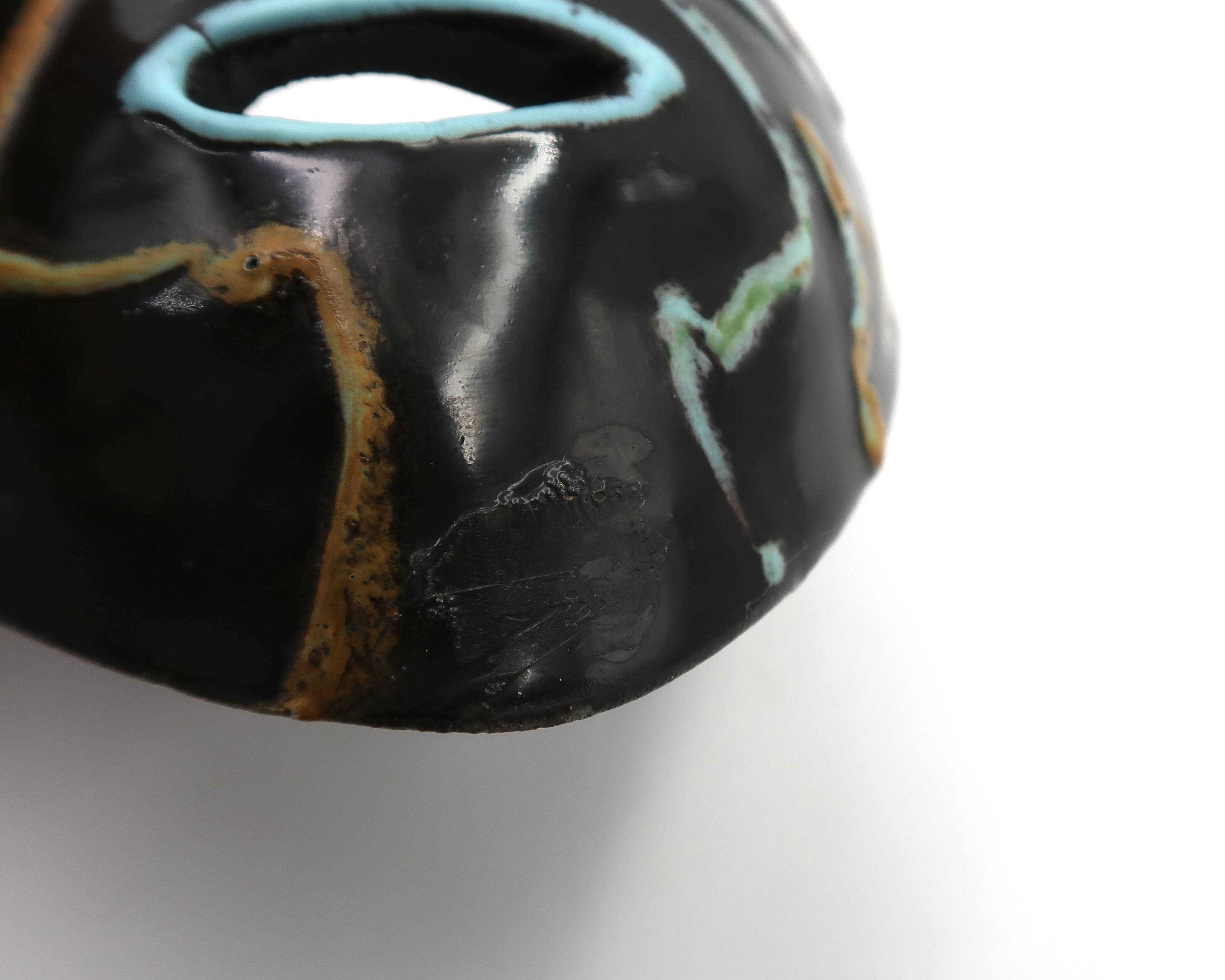 Accolay black ceramic wall mask, 1960s