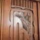 Old solid wood wardrobe with three vintage mirror doors