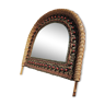 Half-moon rattan mirror