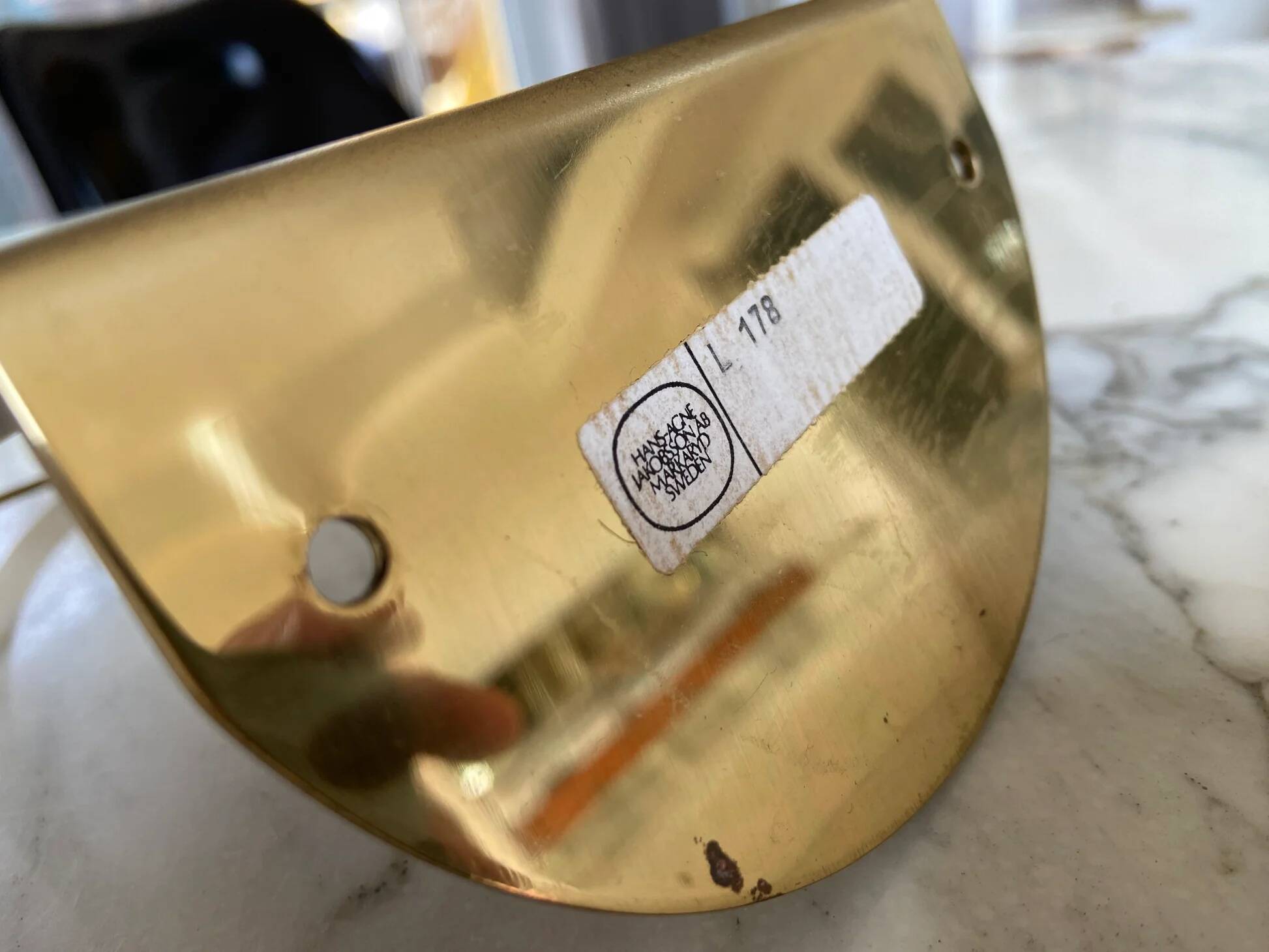 Brass bookends marked Hans-Agne Jakobsson, Sweden, 1960s.