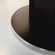 Vintage dining table in melamine with a black wood effect and chrome metal.