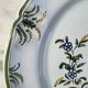 Assiette en faïence de Moustiers décor oiseau et fleurs 25cm