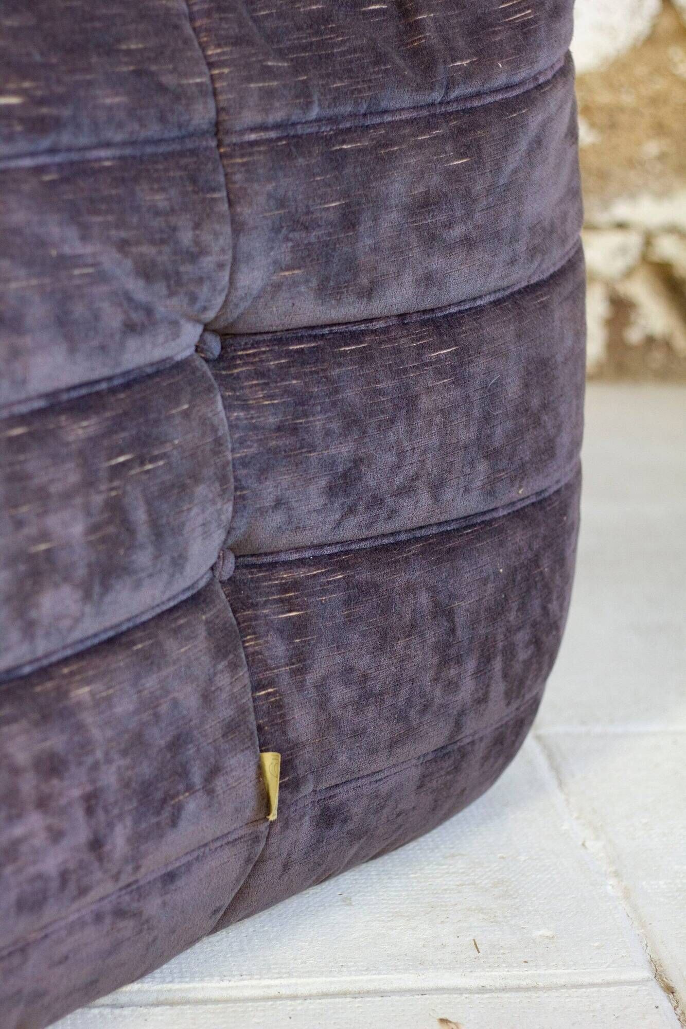 Togo aubergine corner armchair by Michel Ducaroy for Ligne Roset