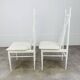 2 Scandinavian slatted chairs, white, from the 1960s.