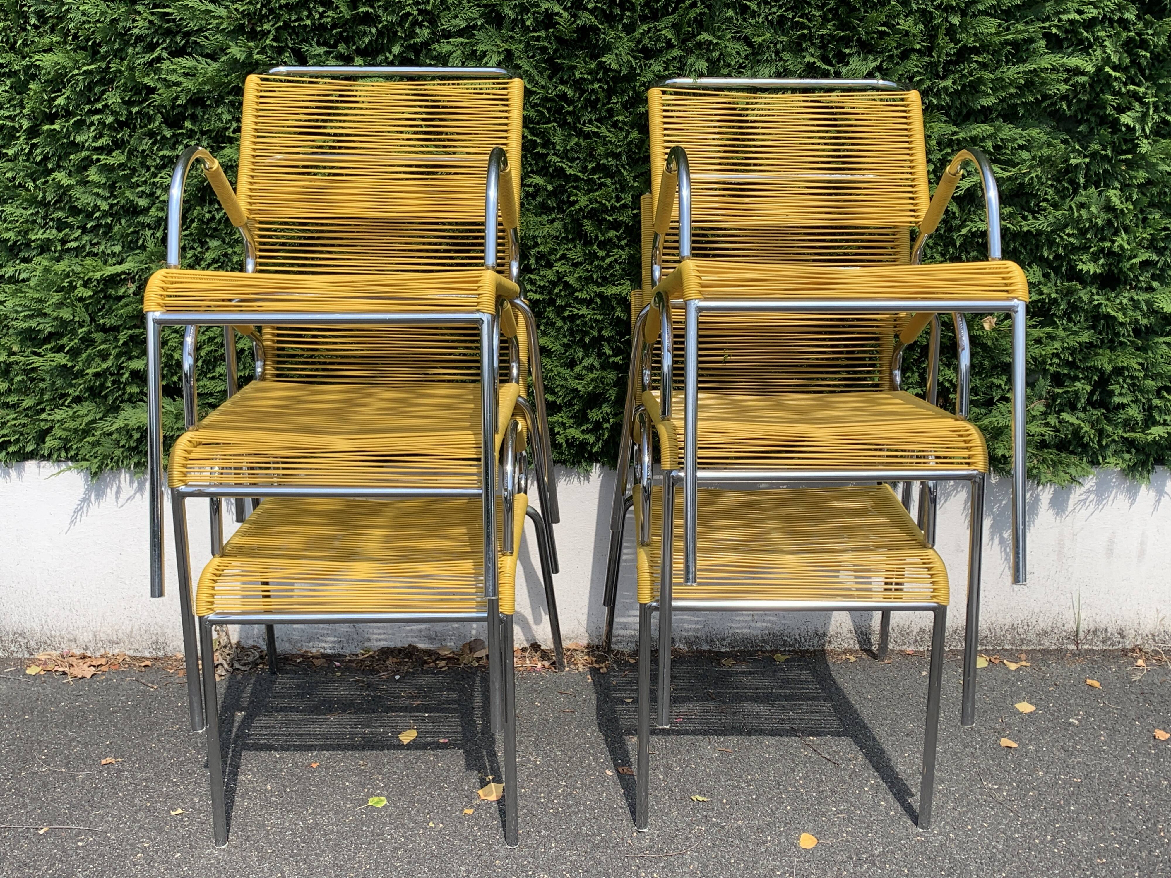 6 yellow and stackable armchairs, scoubidou by Dupré Perrin