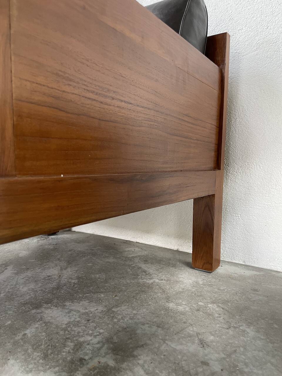 Modernist armchair in exotic wood and leather