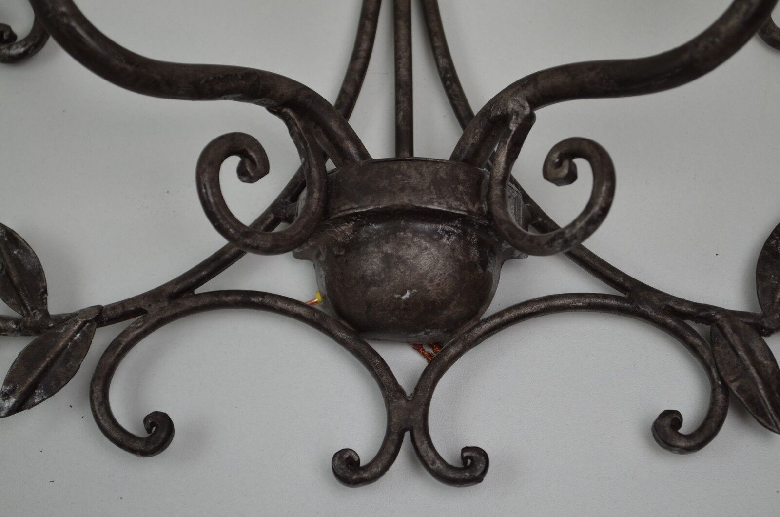 pair of grey patinated iron wall sconces
