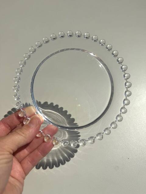 Head to head of crystal plates, Andlau model, signed Lalique