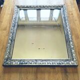 Old mercury mirror, in carved wood with silver leaf.