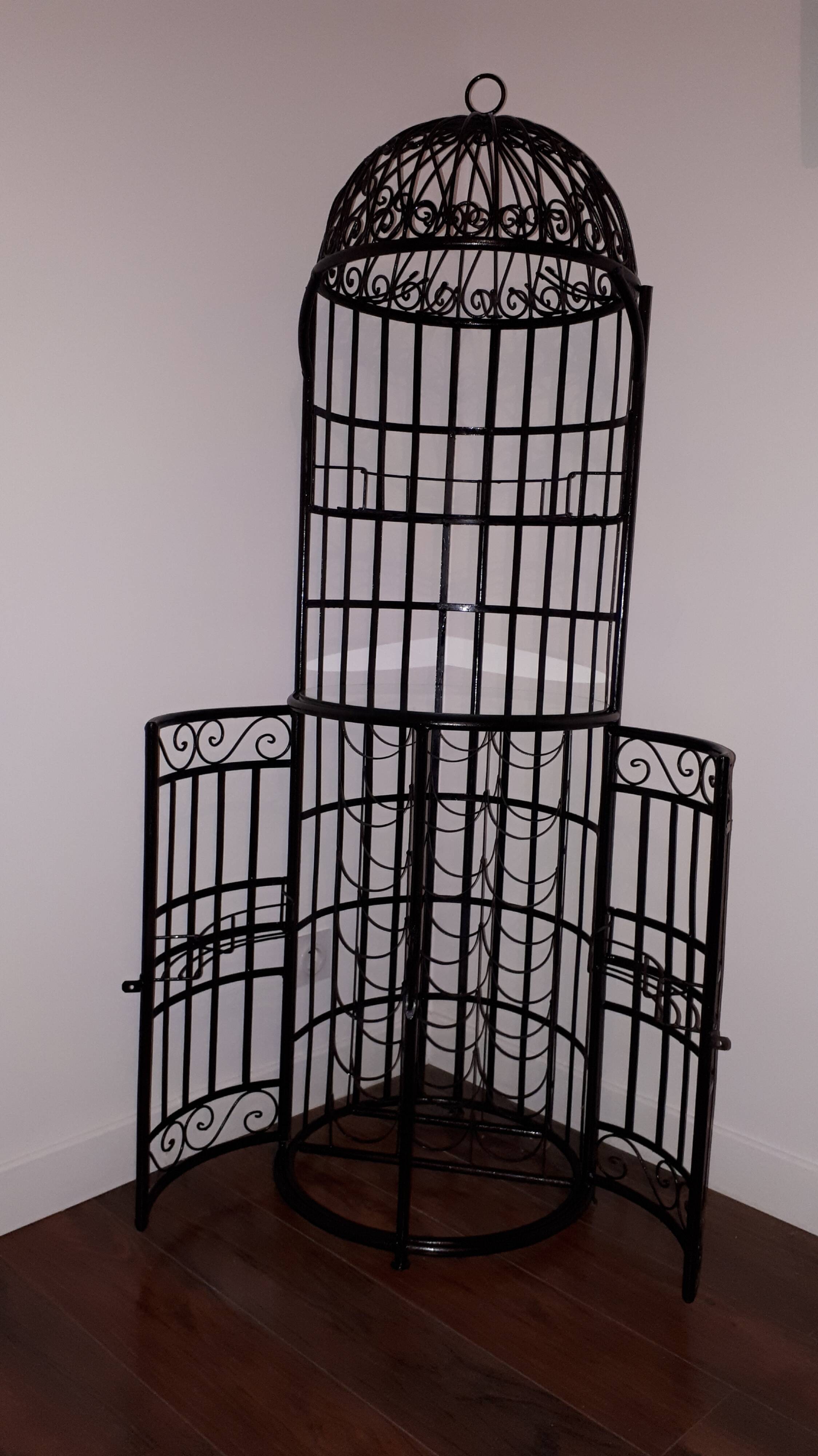 Wrought iron bar with bottles holder