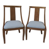 Pair of Gondola heaters, upholstered with a cream curl fabric
