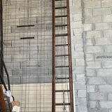 Very large vintage sliding wooden ladder