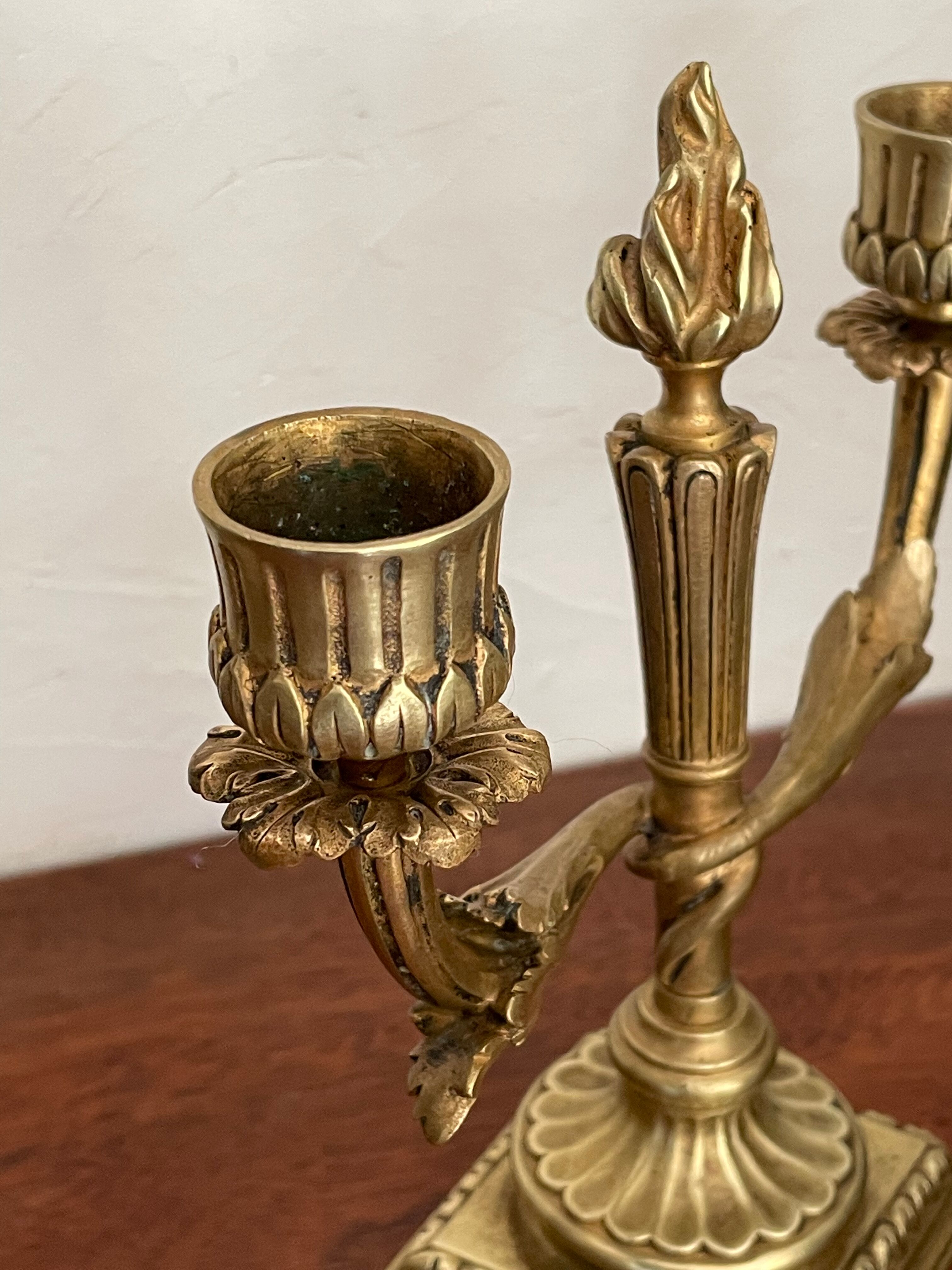 Pair of candle holders in gilded bronze nineteenth century