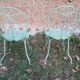 Garden furniture set with 1 table, 2 armchairs, and 2 chairs in antique green wrought iron.