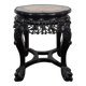 Side table with a wooden frame and marble top.