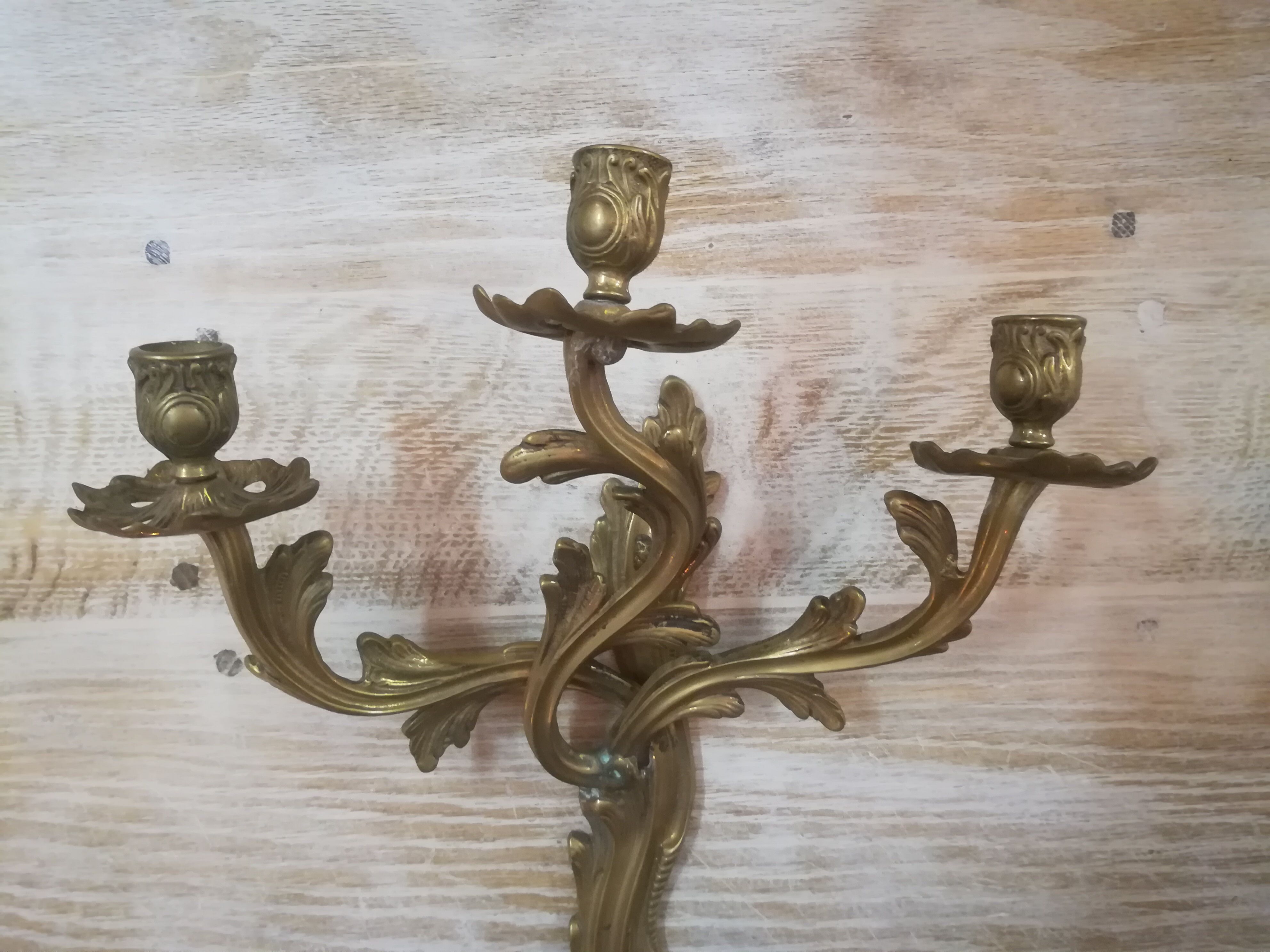 Pair of Louis XV style gilded bronze sconces