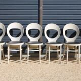 6 baumann chairs, white gull with black faux leather.