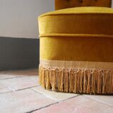 Toad in yellow velvet armchair