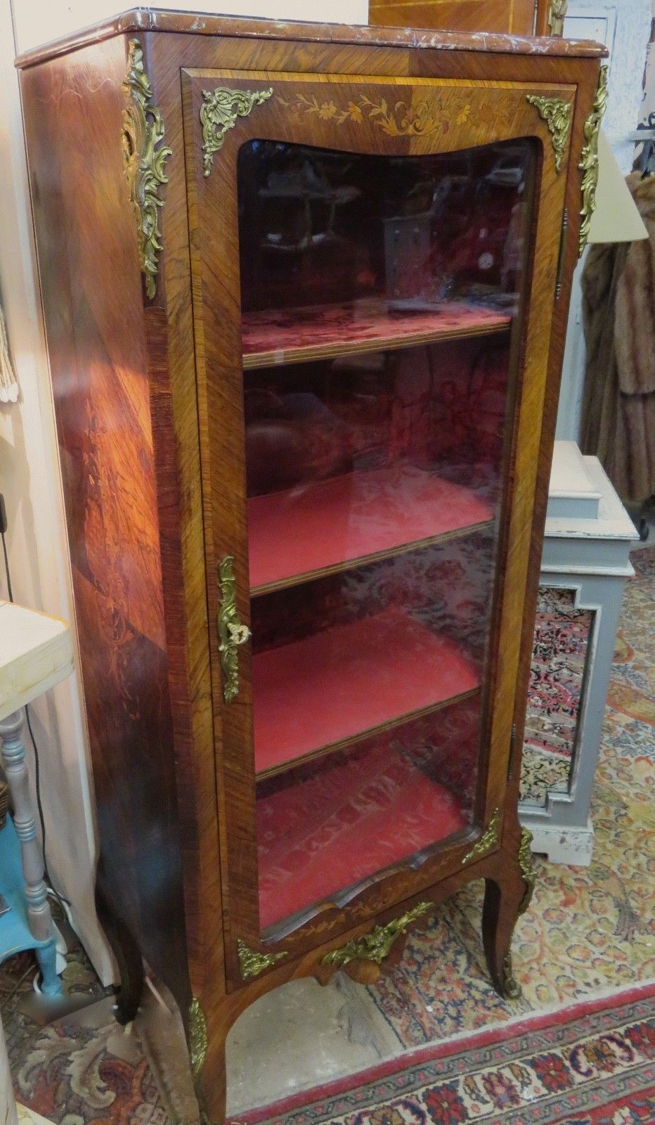 Showcase bronze Louis XV decorated with marquetry veneer