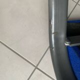 Black metal design armchair with blue fabric. 1980s.