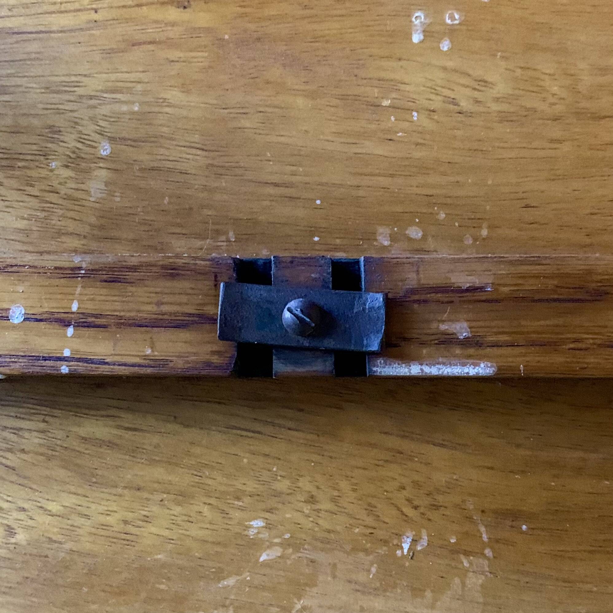 Old foldable fisherman's stool in wood and leather