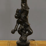 Lamp monkey learned juggler in patinated bronze
