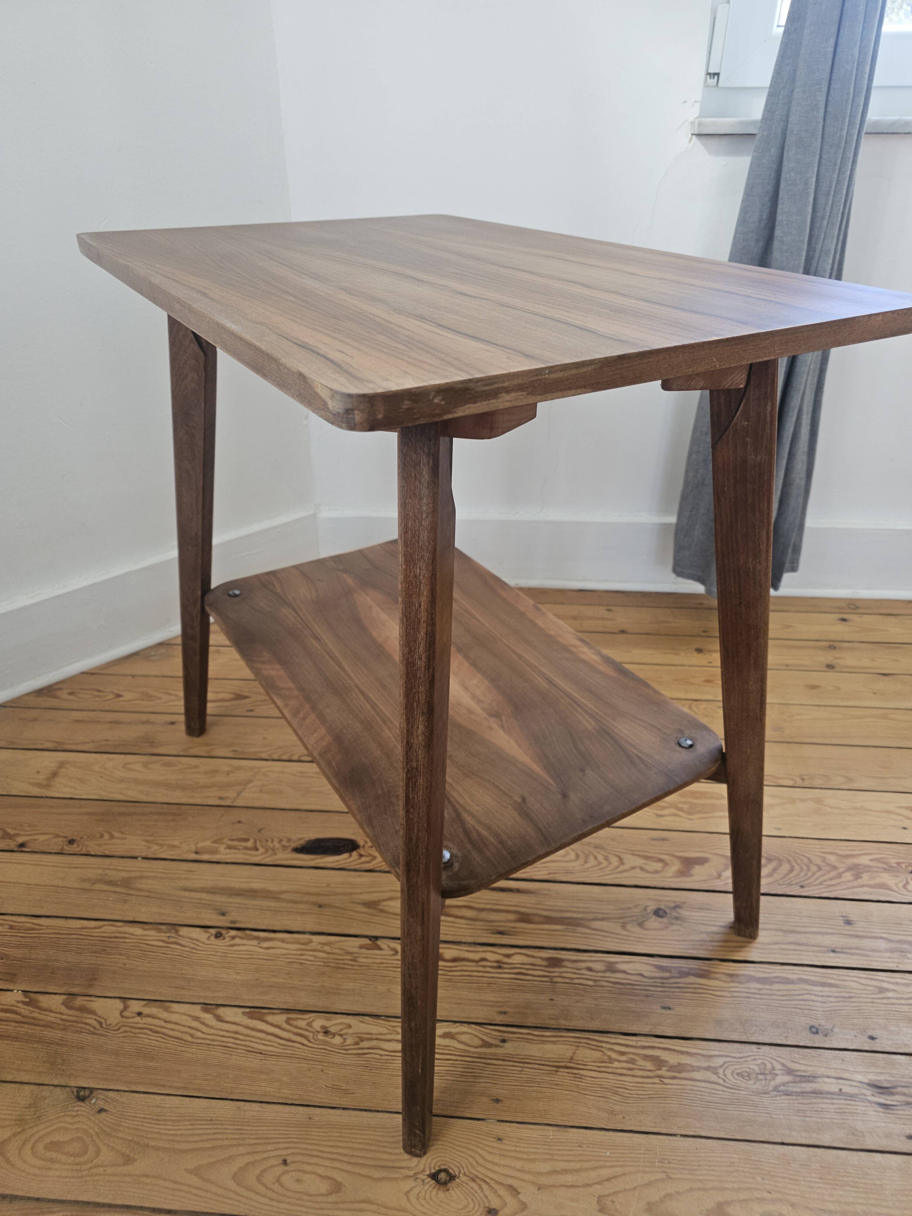 Vintage side table with double top in Scandinavian style.