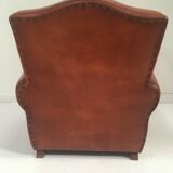 Large club chair in cognac leather