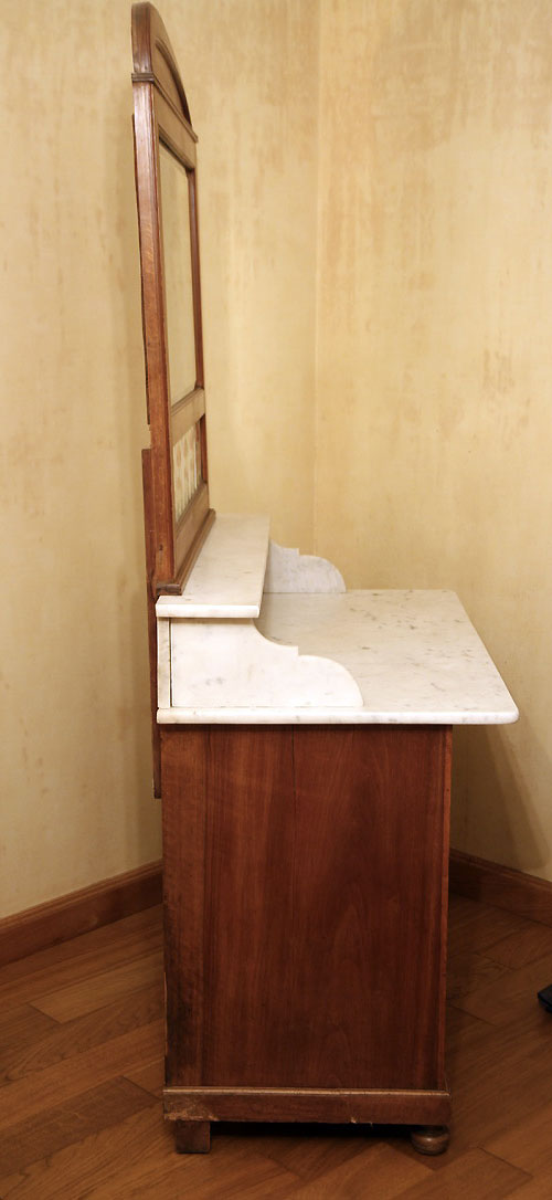 Vintage vanity toilet furniture with marble top.