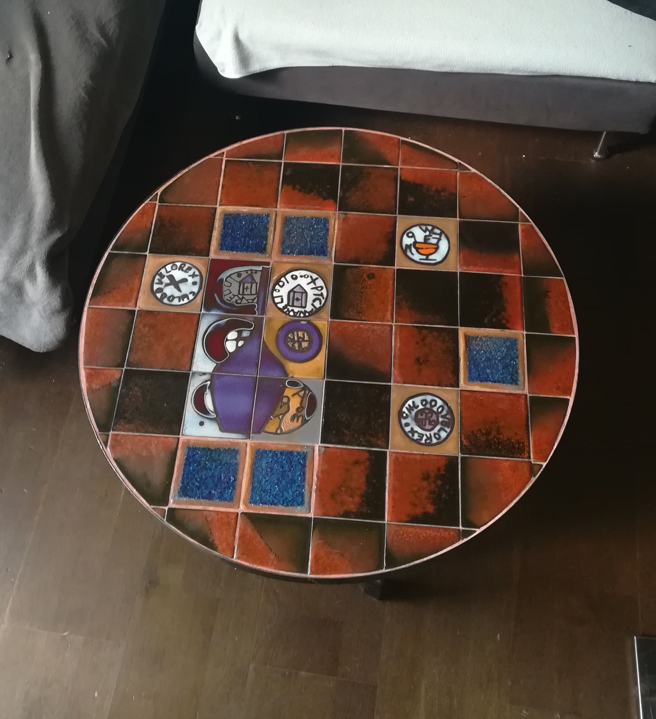 Coffee table, ceramic tray, metal feet, circa 1960