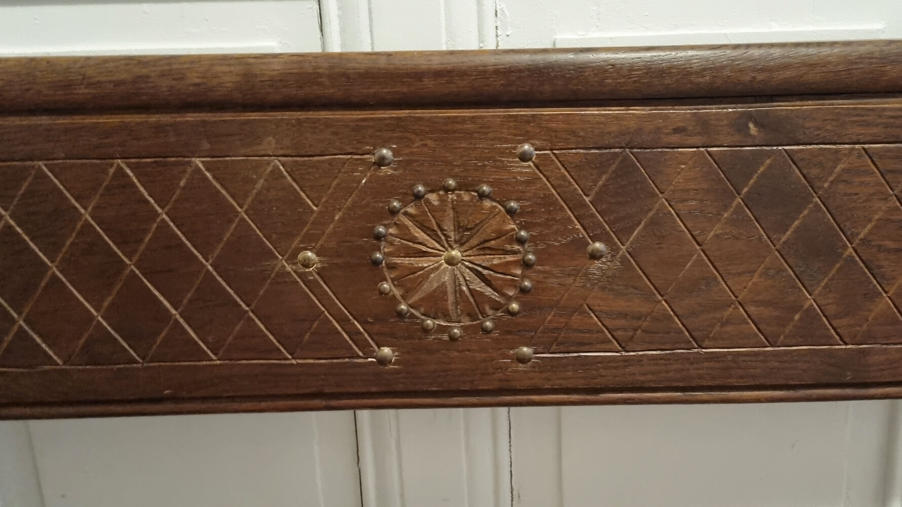 Stylized church pew, early twentieth century, solid wood