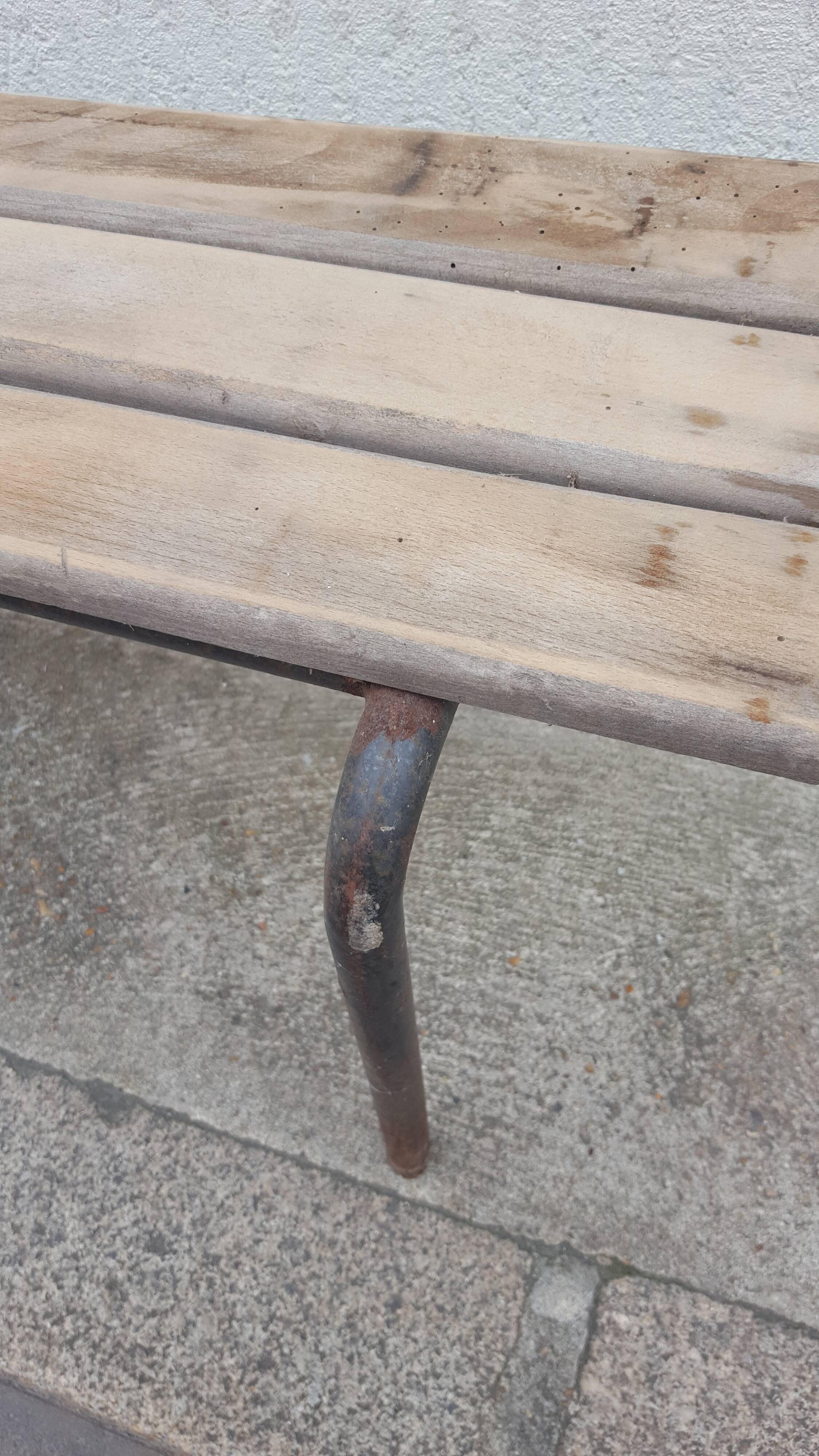 Wooden and vintage metal school bench