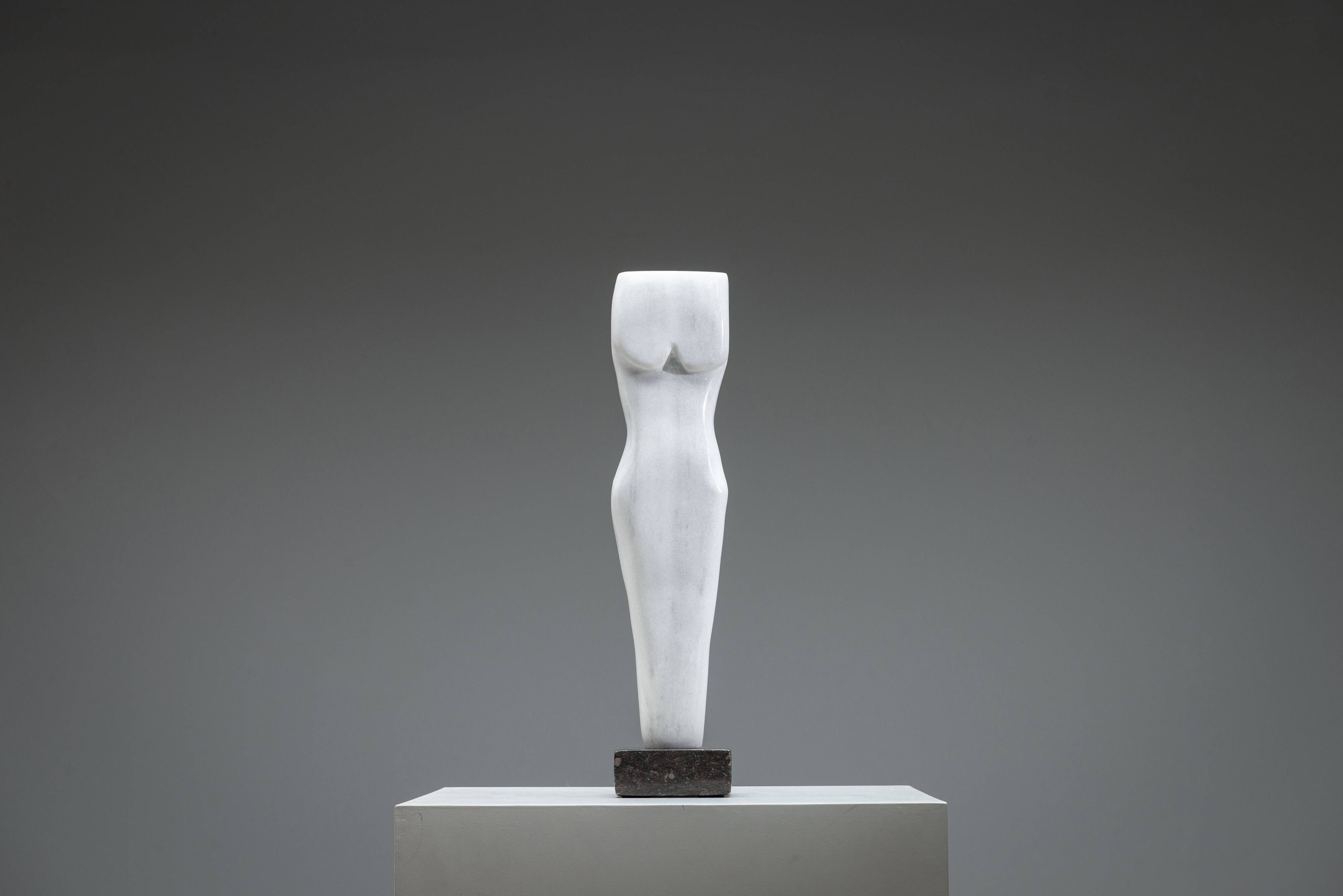 Abstract solid white marble torso