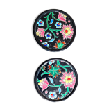 Pair of Longwy flower bottle underwear on black background. Rare