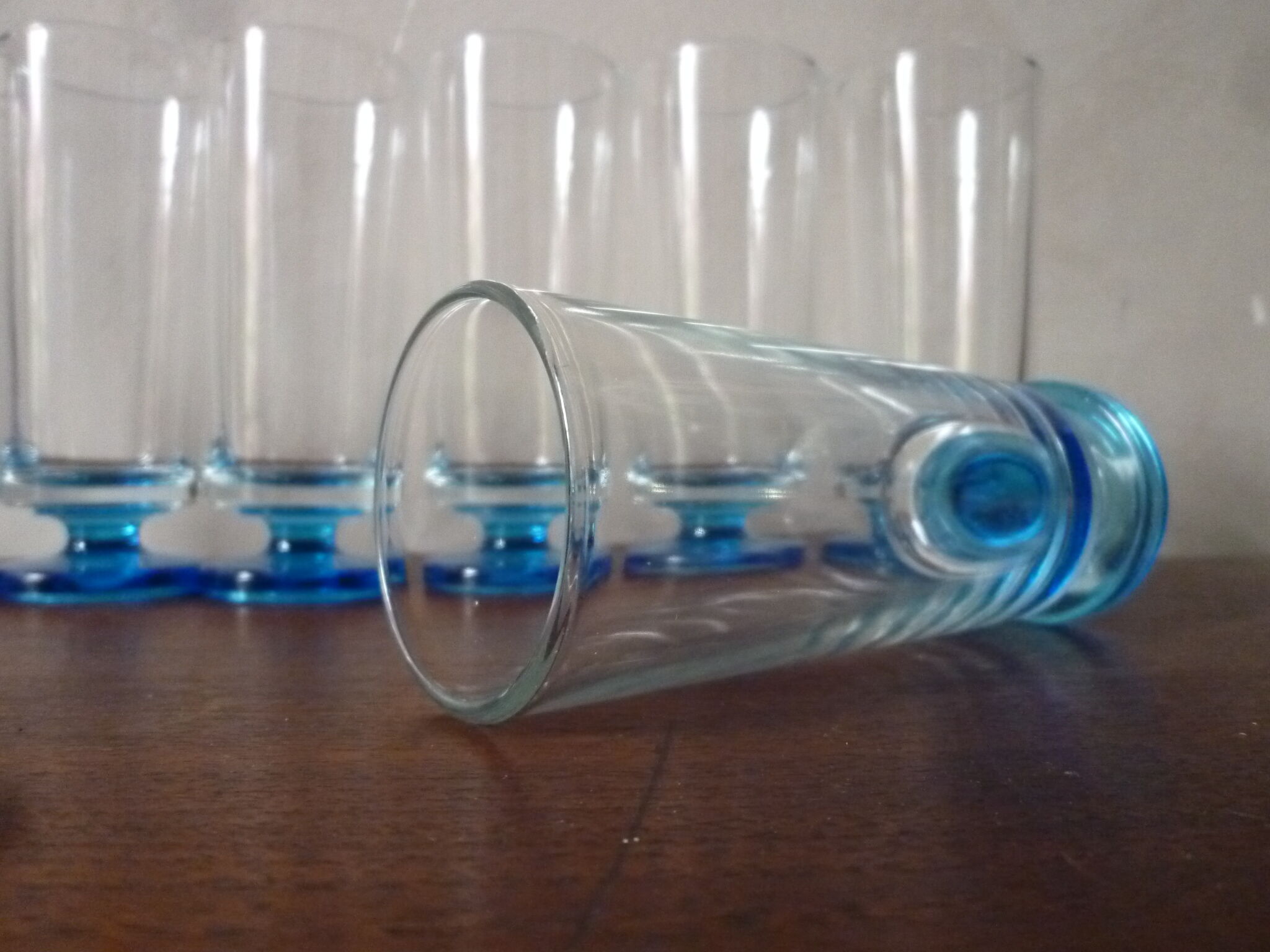 9 vintage champagne flutes with blue foot