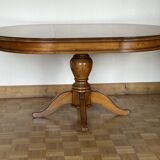 Louis Philippe solid cherry table with 2 extensions.