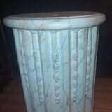 Column topped with a plaster basin.