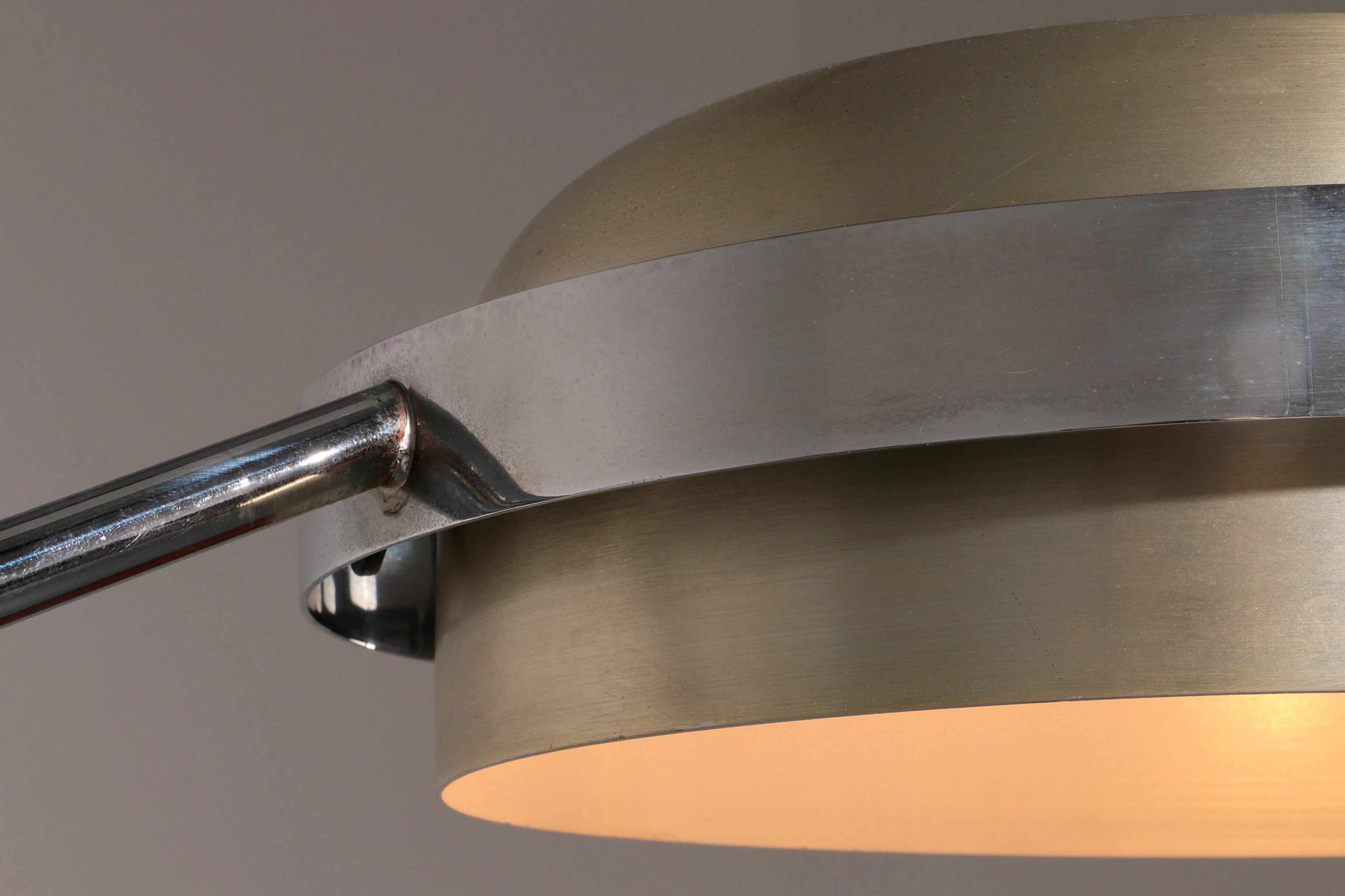 Iconic 1970s chrome arc floor lamp with adjustable swing arm, 1970 Italy