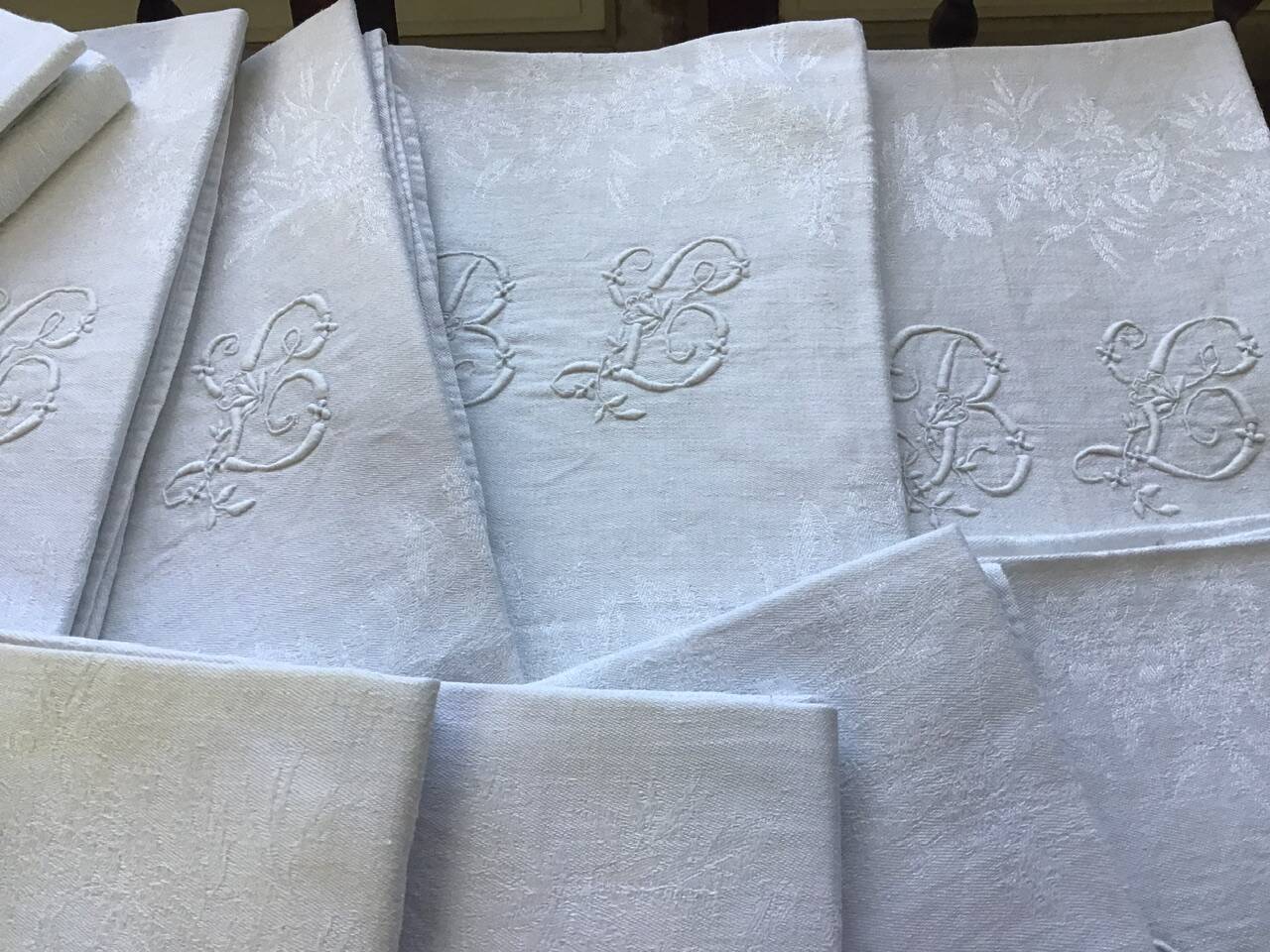 Set of 12 19th century white napkins marked “BL”