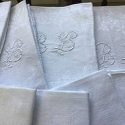 Set of 12 19th century white napkins marked “BL”