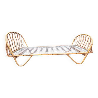 Vintage rattan basket bed