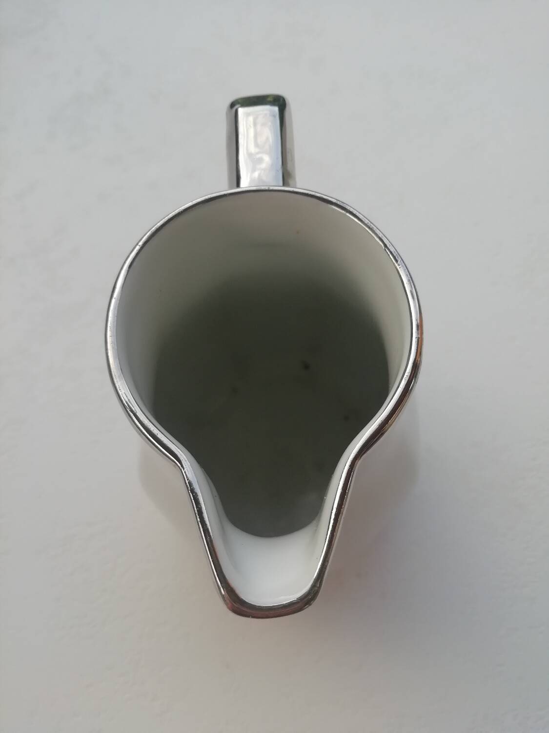 Pair of milk jug teapots