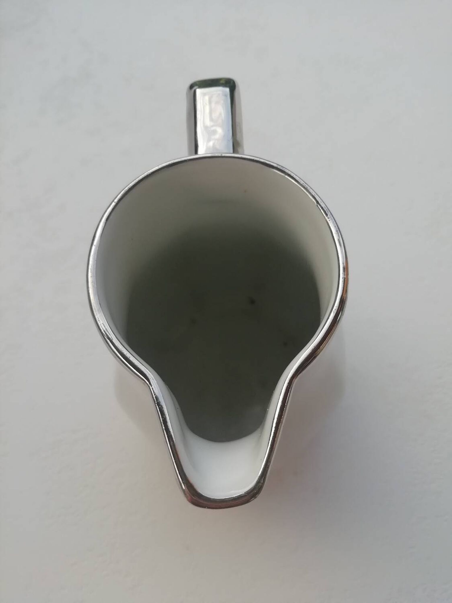 Pair of milk jug teapots