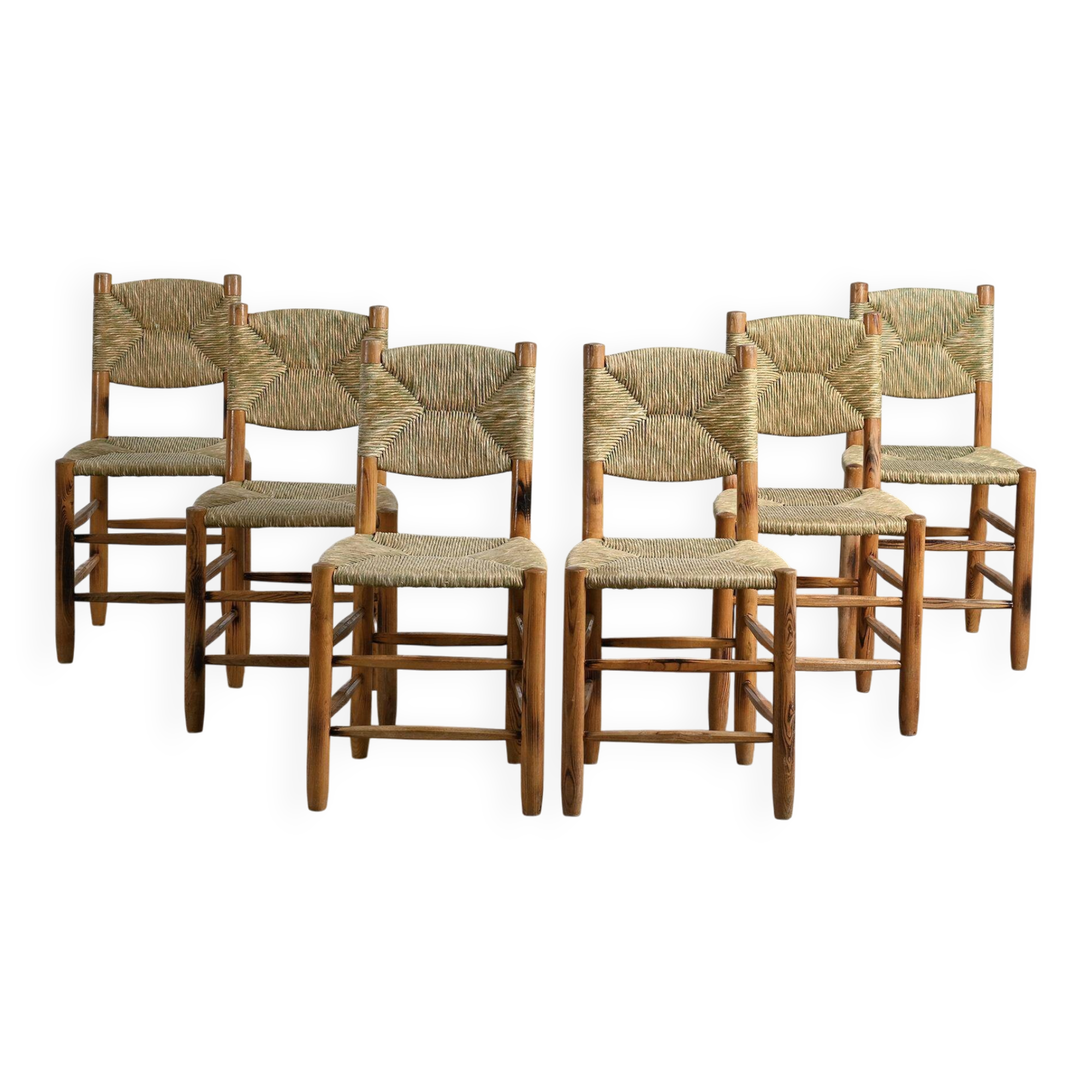 Set of 6 Bauche model chairs by Charlotte Perriand, circa 1960.